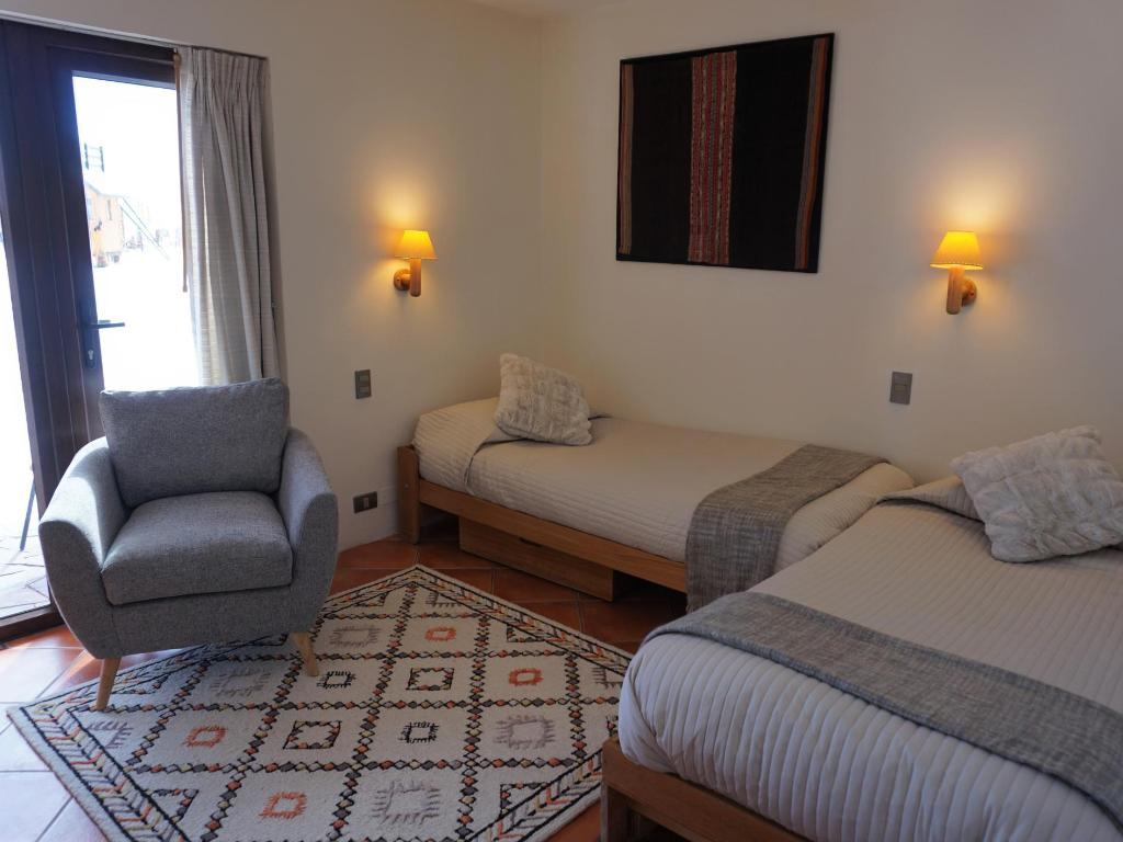 Sala con dos camas - Departamento Tipo A 103