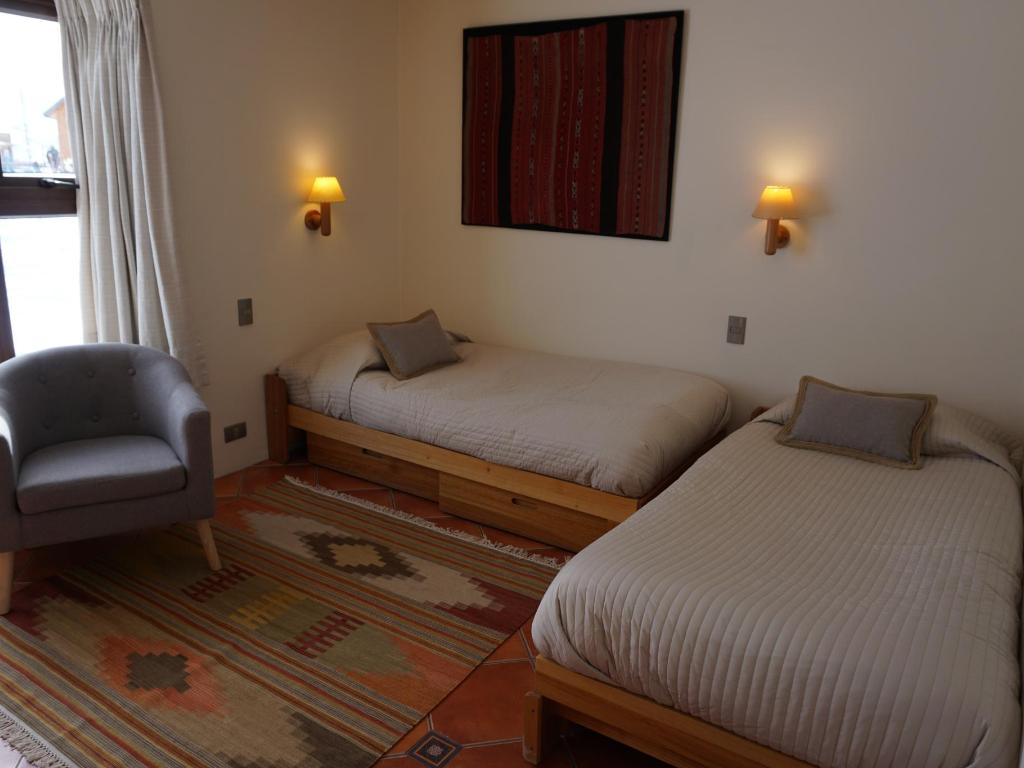 Sala con dos camas - Departamento Tipo A 104